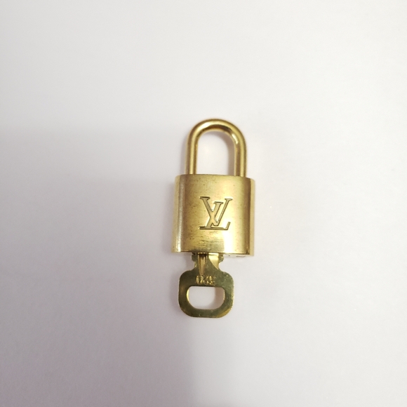 Louis Vuitton Gold Padlock with Key - Picture 12 of 12